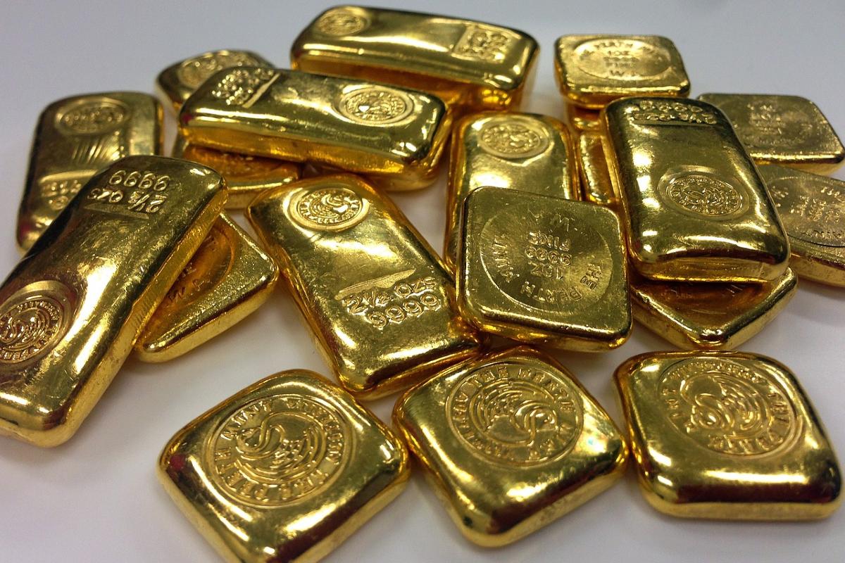 https://www.bomdiamercado.com.br/wp-content/uploads/2023/12/commodity-ouro-metal-onca-troy.jpg